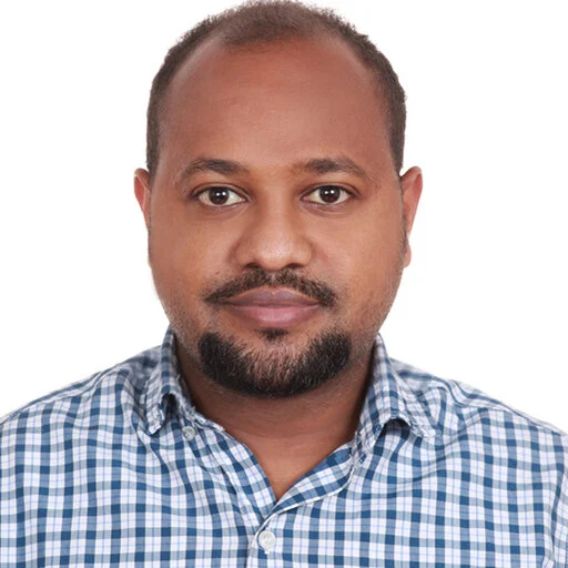 Dr Tedele Negash — Research Team